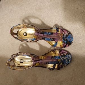 Multi colored heels that go great with various colors size 9.